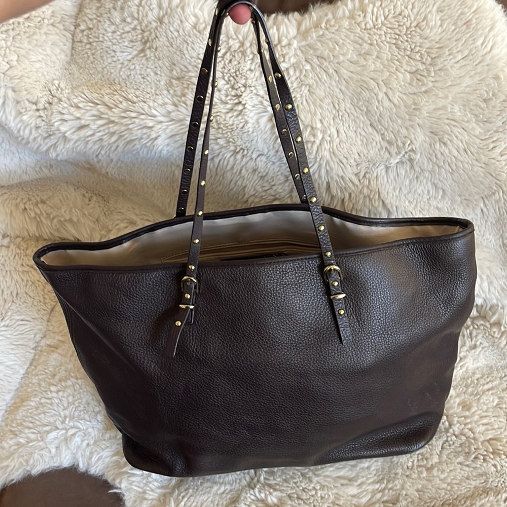 Talbots chocolate brown leather tote with gold studded buckle straps. Like new!